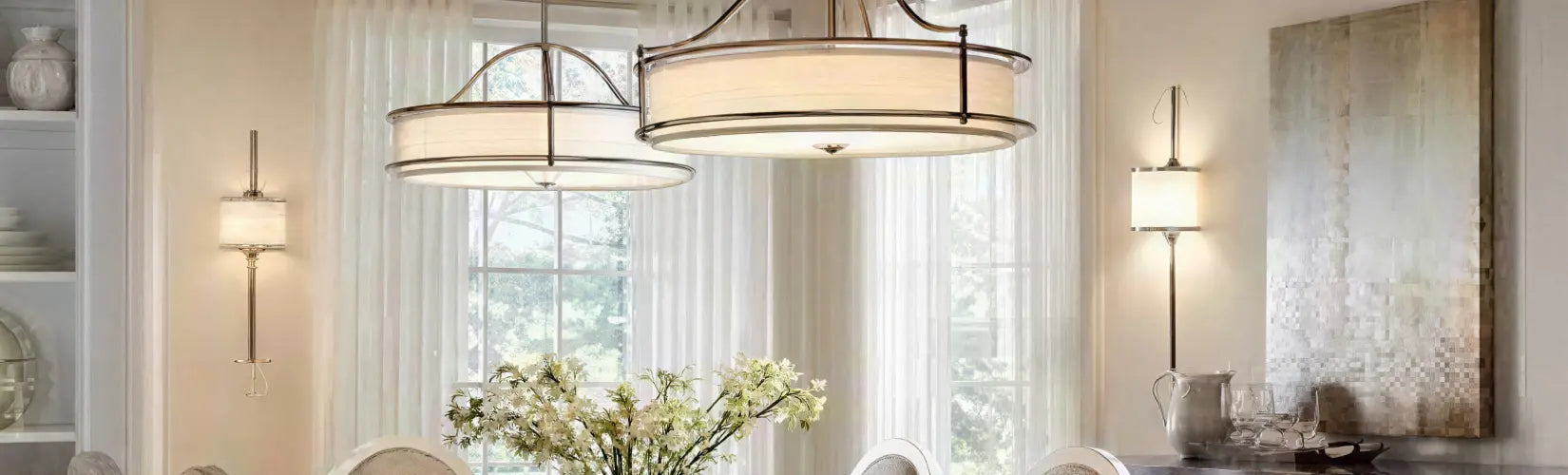Kitchen with black pendant lights and oak bar stools