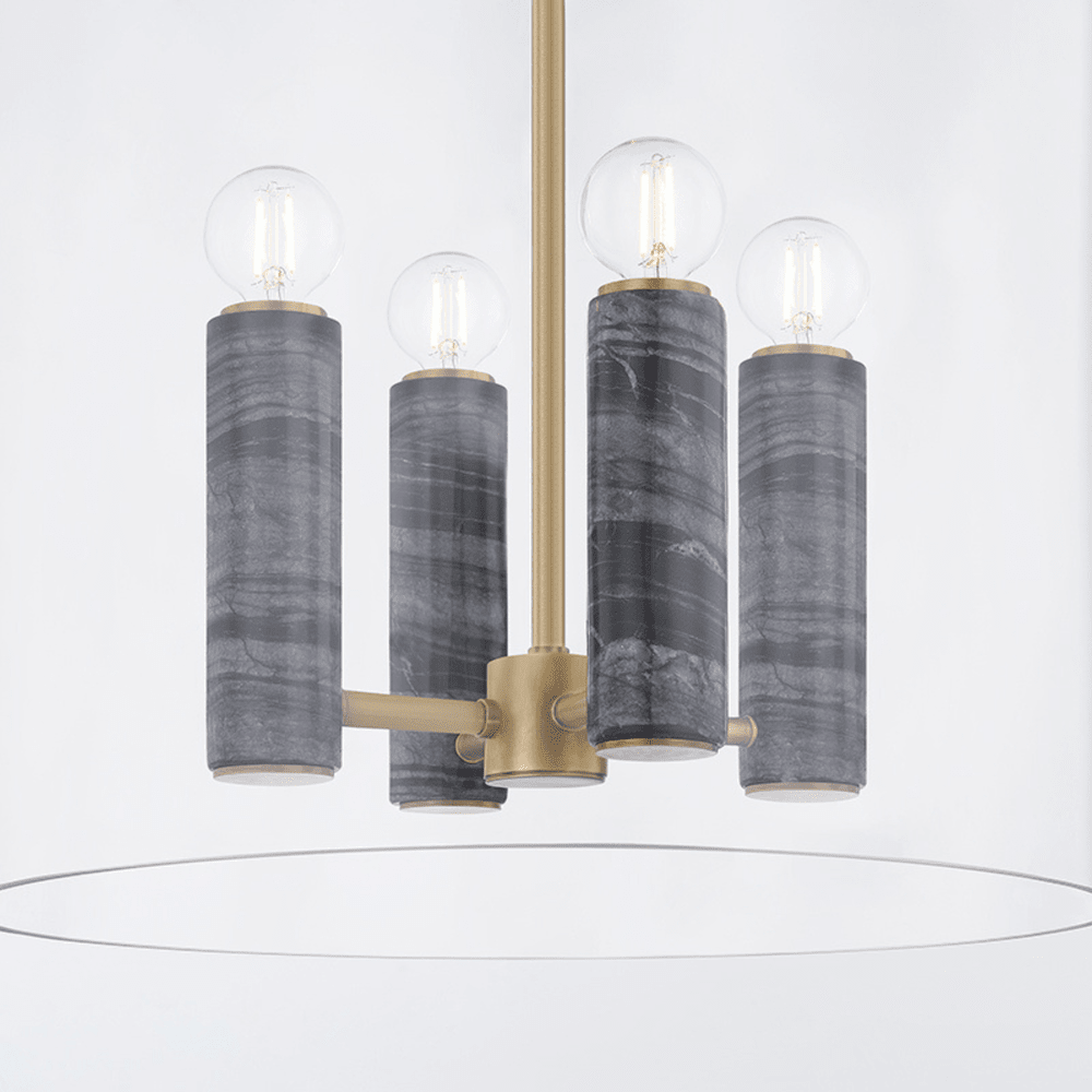 The Adonis Lantern Light - Brass features four cylindrical Nero Madera Marble-like shades with exposed round bulbs on a Vintage Brass frame, creating a modern chandelier with a subtle lantern silhouette against a white background.