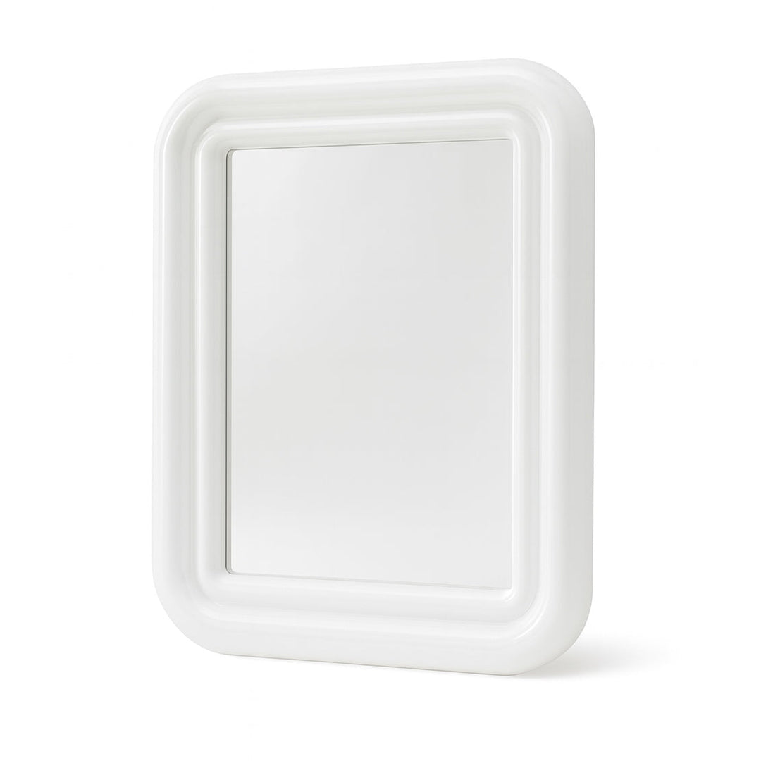 White mirror with curved edges on white background