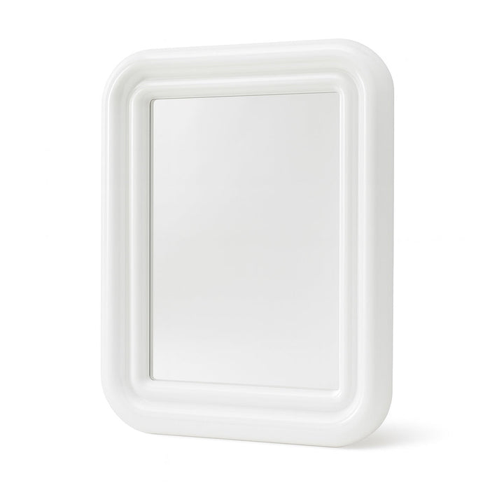 White mirror with curved edges on white background