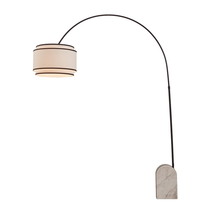 Curved floor lamp with marble base and white shade with black contrast piping on a white background