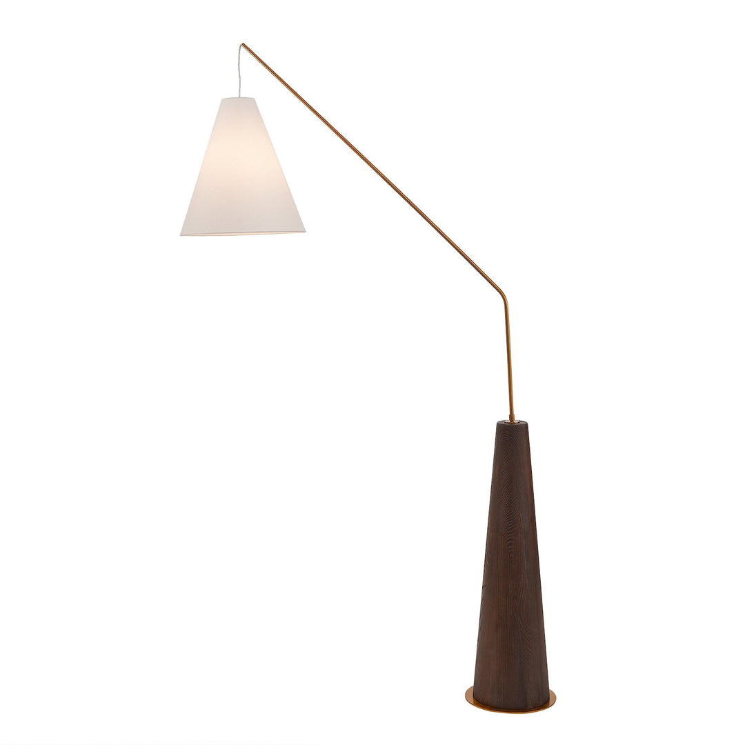 Wooden base angular lamp turned on on plain white background
