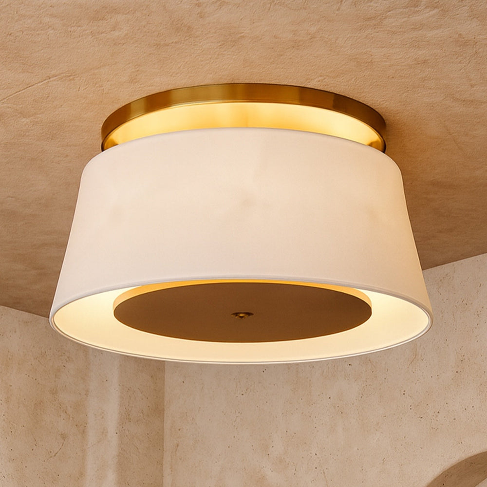 White ceiling lamp with bronze accent fixing on a neutral background