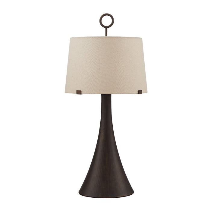 Wooden base table lamp with neutral linen shade on a white background