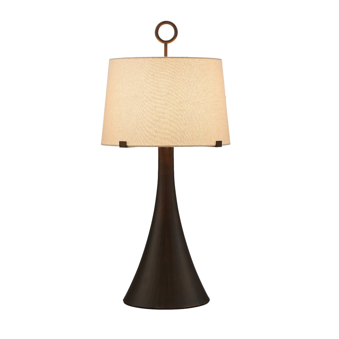 Wooden base table lamp with neutral linen shade turned on, on a white background