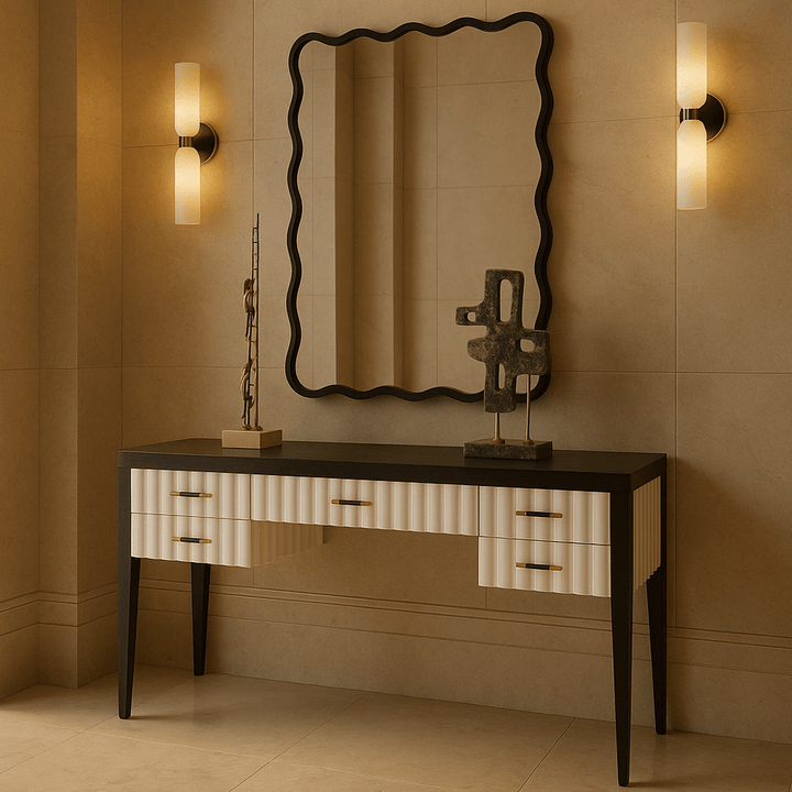 Black wavey edge mirror above a console table