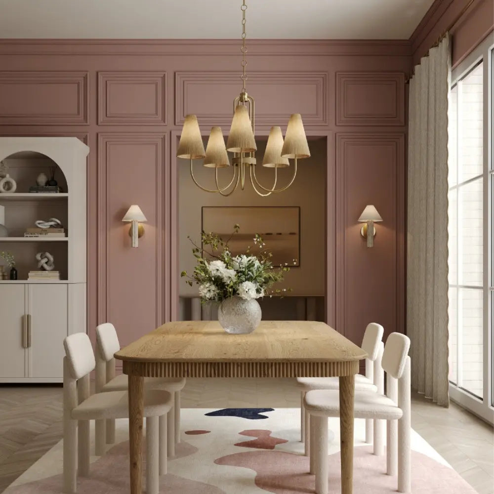 Dining room with wooden table, chairs, and decorative elements.