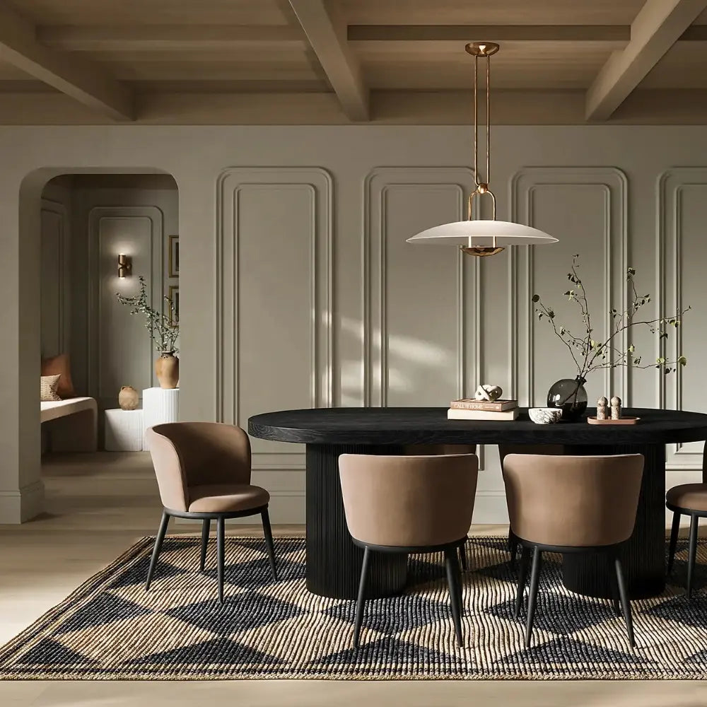 Modern dining room with a black round table and beige chairs.