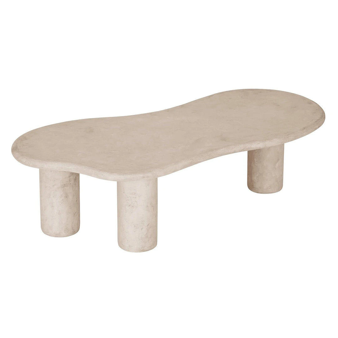 Beige stone coffee table with a unique design on a white background
