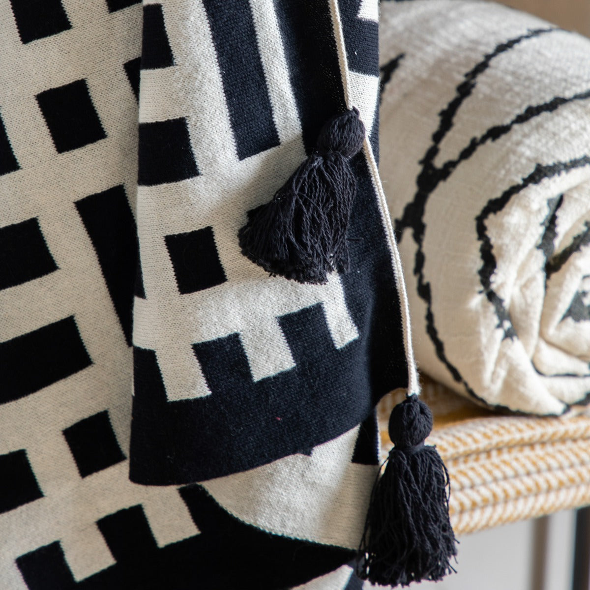 Gallery Interiors Merton Knitted Tassel Throw Black