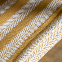 Gallery Interiors Merton Knitted Tassel Throw Ochre