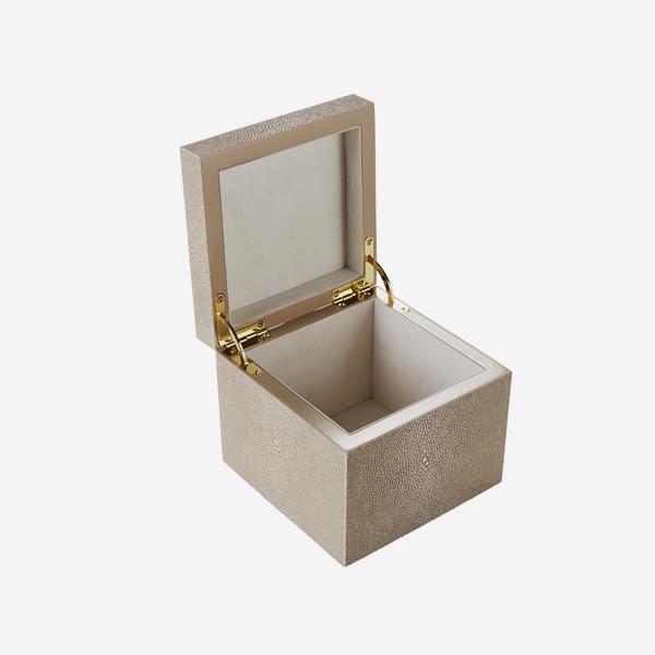 Andrew Martin Liza Box Cream elegant cream faux shagreen exterior, gold hardware, and a smooth velvet interio 