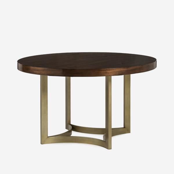 The top is a dark grained walnut veneer and sits above a moulded steel frame with a brushed brass finish.