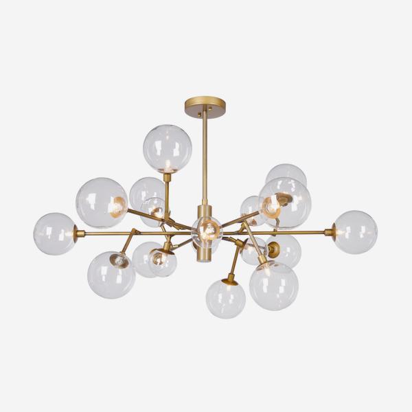 A ceiling light featuring a cluster of bulbs extended on gold arms. 
